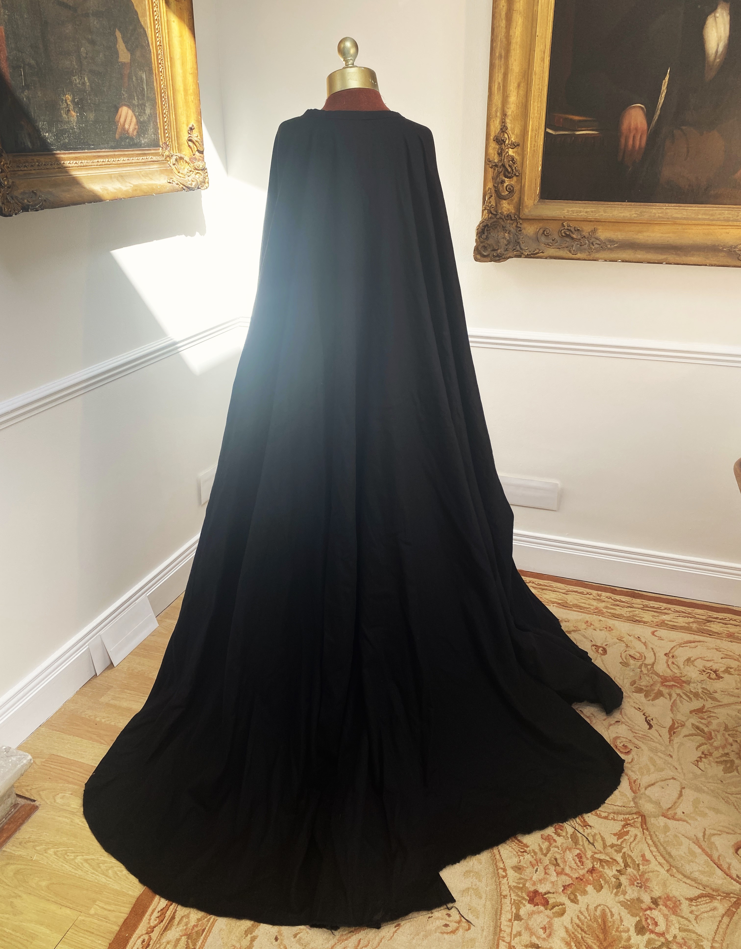 A men’s black heavy cotton cloak – with label Royal Opera House ‘Tannhauser’ – pilgrim character